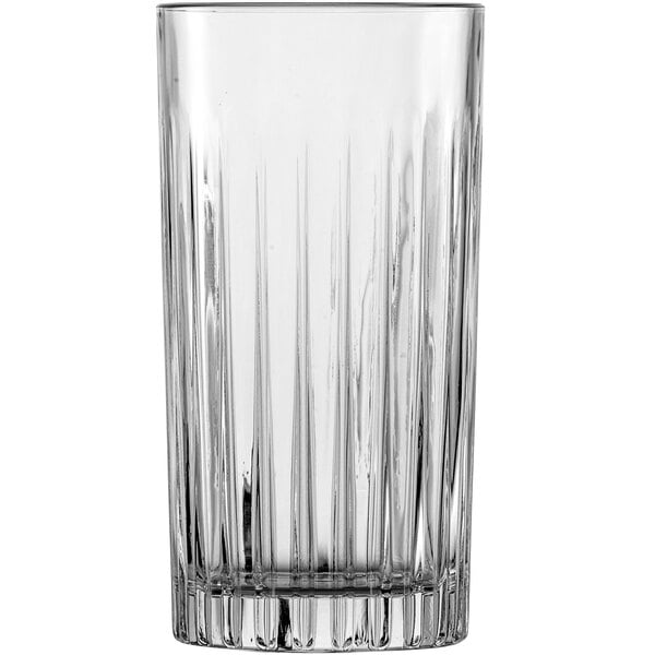 A close-up of a Fortessa Stage Beverage Glass with a ribbed rim.