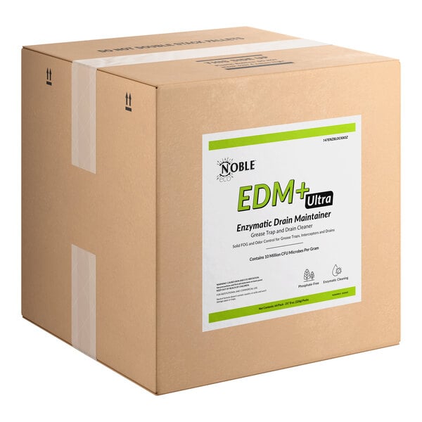 A large cardboard box labeled as Noble Eco EDM+ Ultra Enzymatic Drain Maintainer, used for grease trap and drain cleaning.