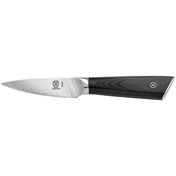 A Mercer Culinary Damascus paring knife with a black handle and silver blade.