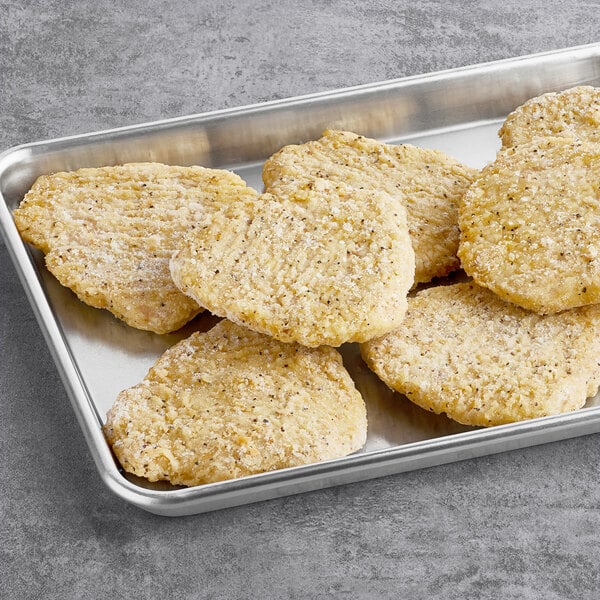 A tray of Tindle plant-based breaded chicken patties.