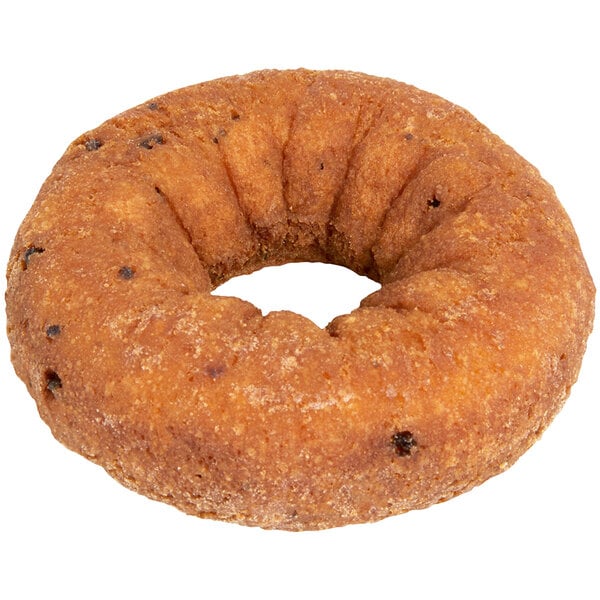 A close up of a Rich's blueberry cake donut ring with chocolate chips on top.