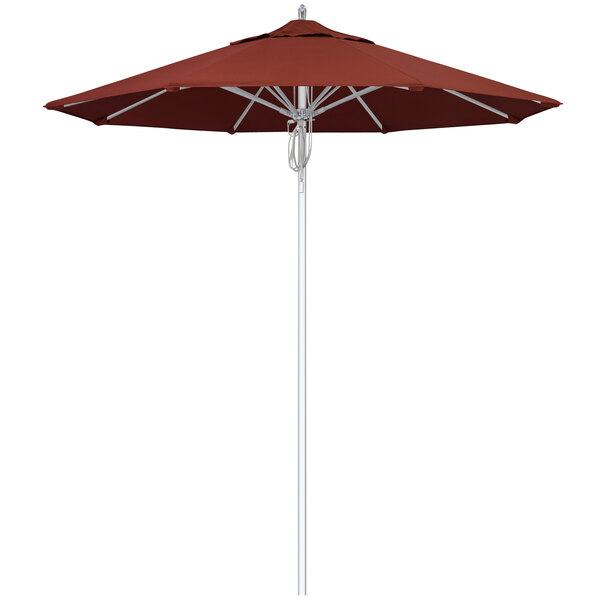 A close-up of a red California Umbrella with a Henna Sunbrella canopy.