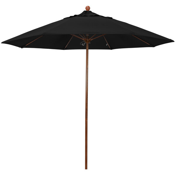 A California Umbrella black outdoor umbrella with an American oak pole.