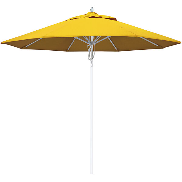 A close-up of a Sunbrella sunflower yellow outdoor umbrella.