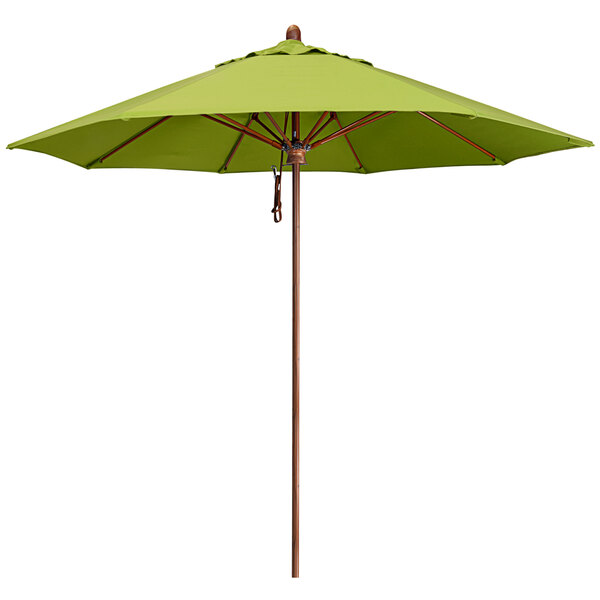 A close up of a green California Umbrella with a simulated wood pole.