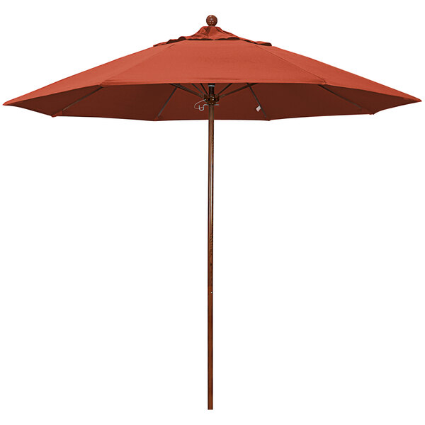 A California Umbrella red outdoor umbrella with an American oak pole.