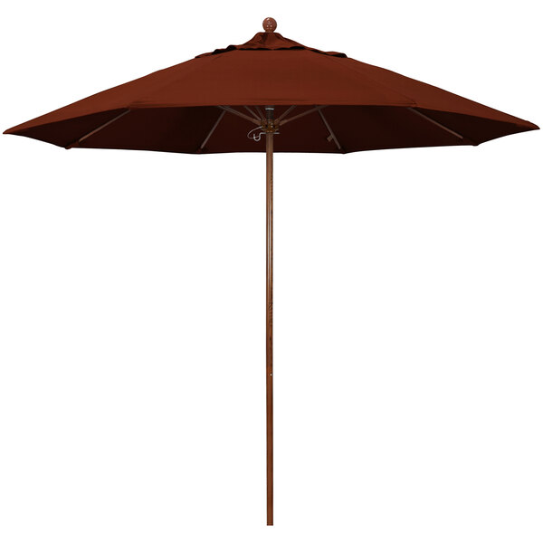 A brown California Umbrella with a pole and brown canopy.