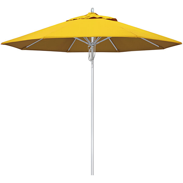 A close-up of a yellow California Umbrella with Sunflower Yellow Sunbrella fabric.
