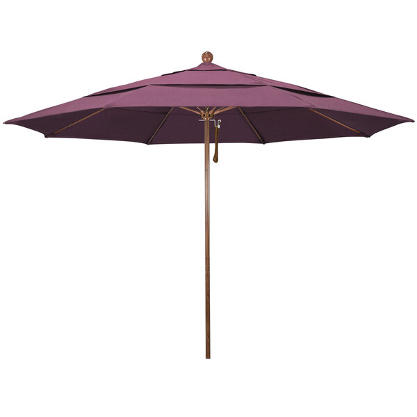 A purple California Umbrella with a wooden pole.