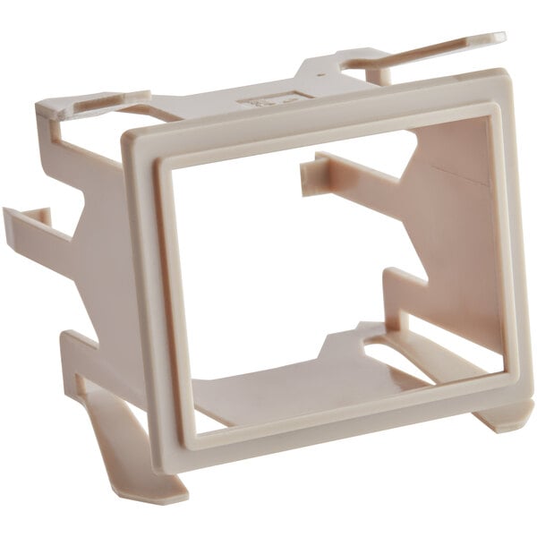 A white plastic frame with a square hole.