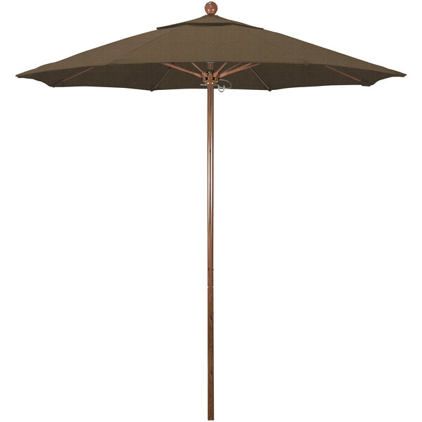 A brown umbrella with a wooden pole.