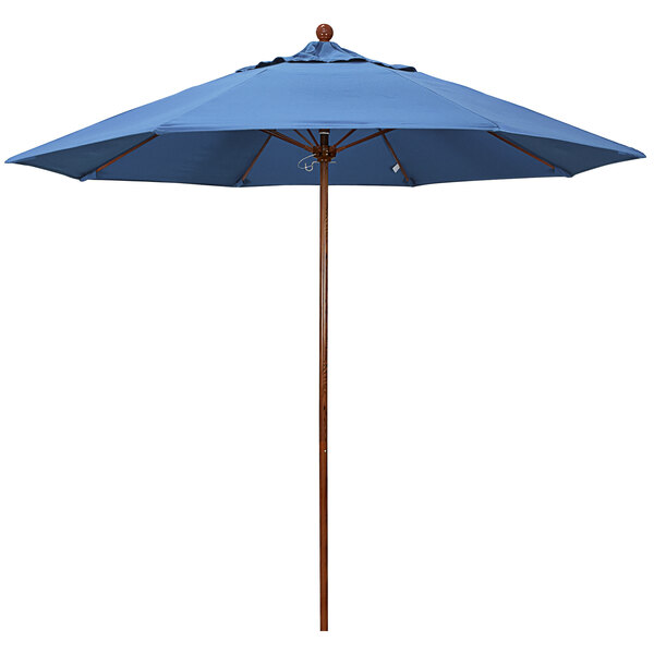 A California Umbrella frost blue canopy with a wooden pole.