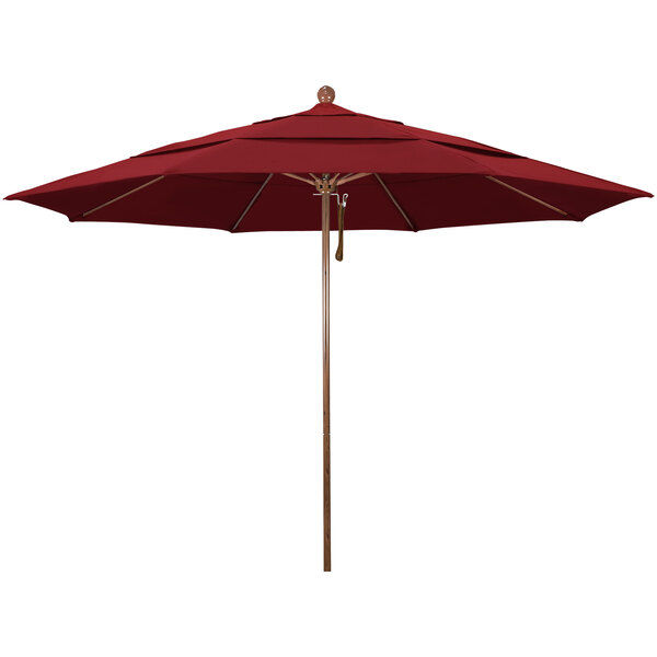 A close-up of a red umbrella with a wooden pole.