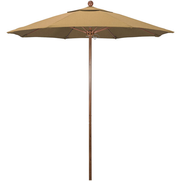 A California Umbrella straw-colored umbrella with a wooden pole.