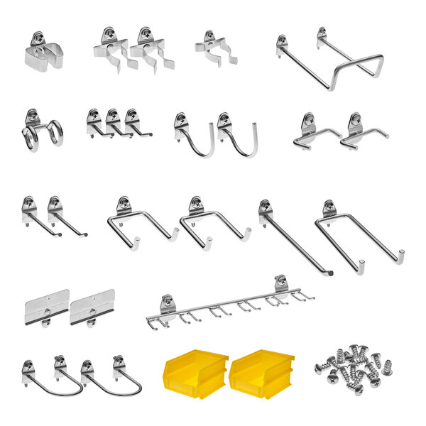 A collection of metal hooks and screws on a pegboard.
