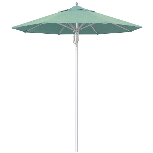 A close-up of a green California Umbrella with a silver pole and spa green canopy.