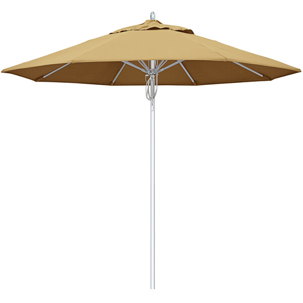 A close-up of a wheat Sunbrella umbrella with silver pole.