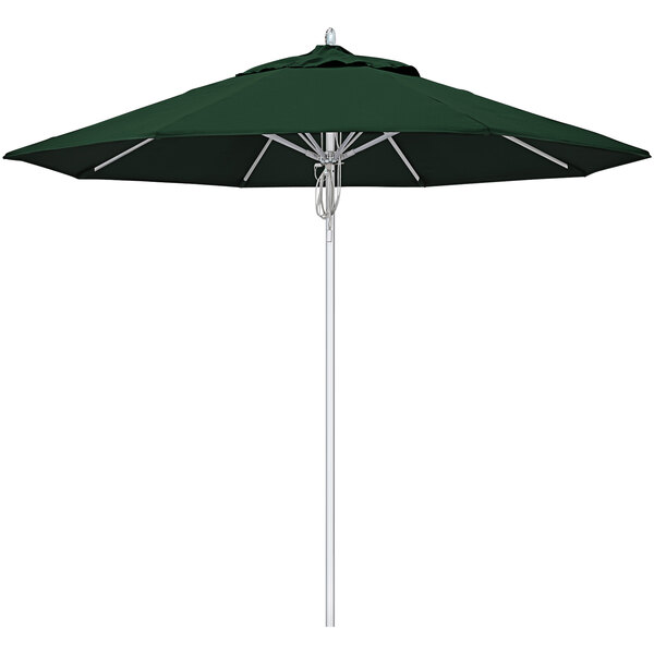A close-up of a forest green California Umbrella with silver pole.
