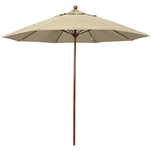 A California Umbrella Venture Series large outdoor umbrella with an American Oak pole and Antique Beige Sunbrella canopy.