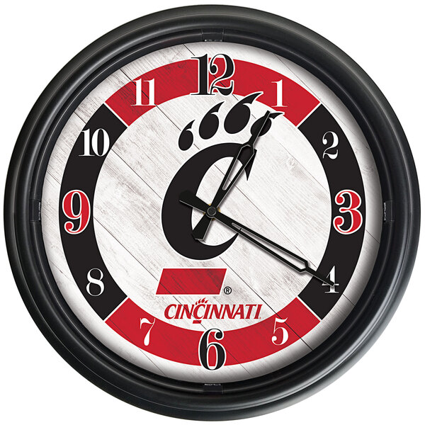 A white Holland Bar Stool wall clock with a black frame and University of Cincinnati Bearcats logo.