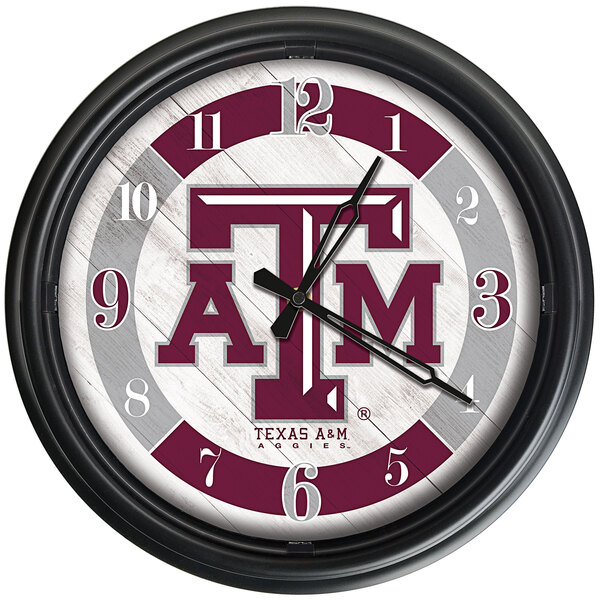 A white Holland Bar Stool wall clock with the Texas A&M Aggies logo on it.