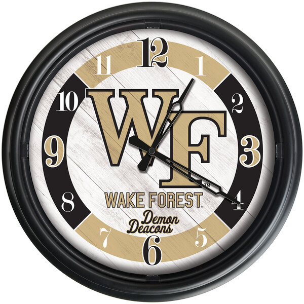 A white and black Holland Bar Stool Wake Forest University LED wall clock with a black frame.
