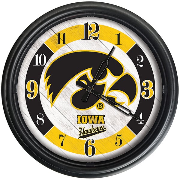 A white wall clock with the University of Iowa Hawkeyes logo in black and yellow.