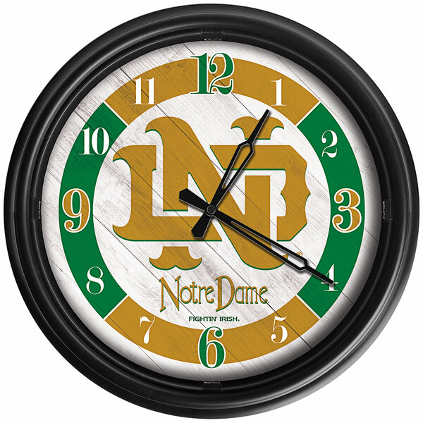 A green and yellow Holland Bar Stool Vintage Notre Dame LED wall clock.