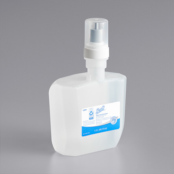 A Scott plastic bottle of clear foaming hand sanitizer with a spray pump.