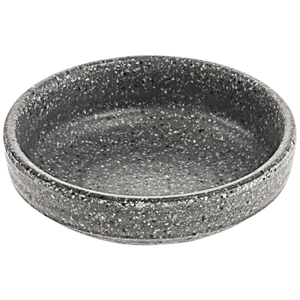 A grey bowl with black and white specks.
