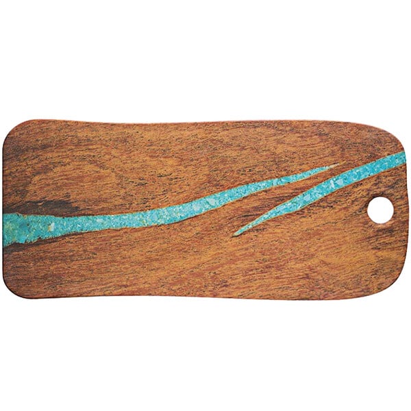 A Cheforward wooden rectangle serving board with blue streaks.
