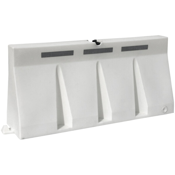 A white plastic barrier with three holes.
