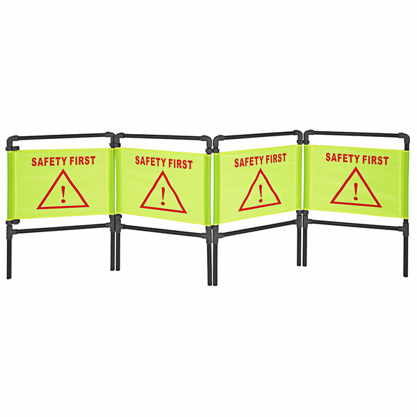 A yellow "Safety First" Vestil folding safety barrier with red text.