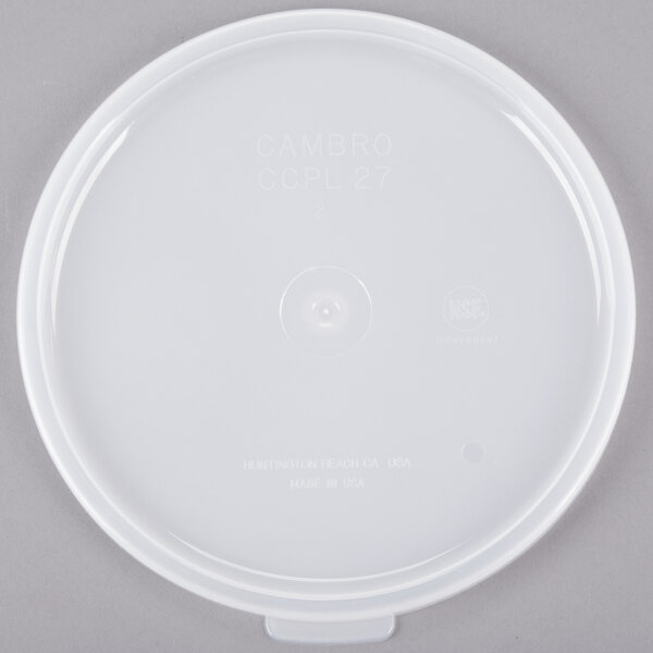 A white polyethylene lid with a round clear center.