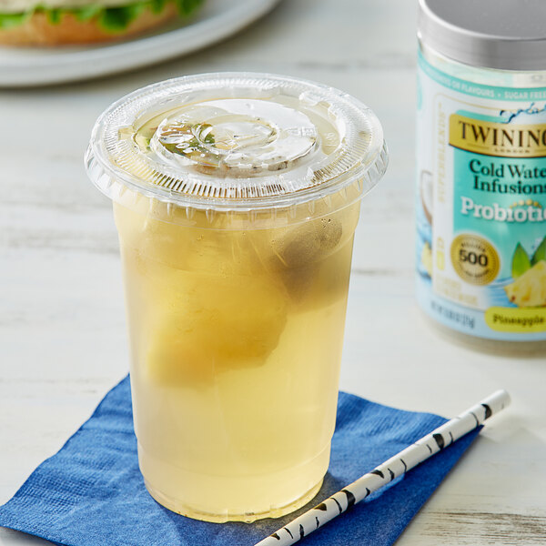 A plastic cup of Twinings Cold Infuse Probiotics+ Pineapple & Coconut.