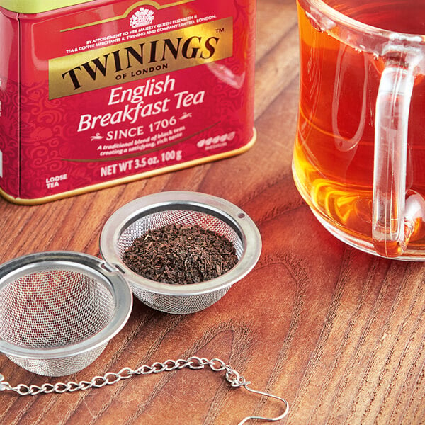 A red Twinings English Breakfast tea box with gold text.
