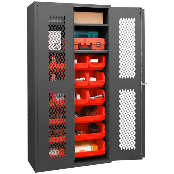 A Durham metal storage cabinet with red bins on the shelves.