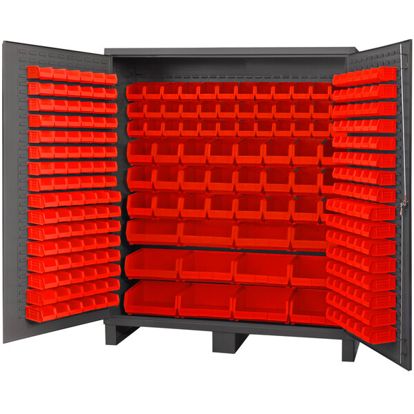 A large metal Durham storage cabinet with red bins on the shelves.