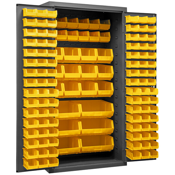 A large metal Durham storage cabinet with yellow bins on shelves.