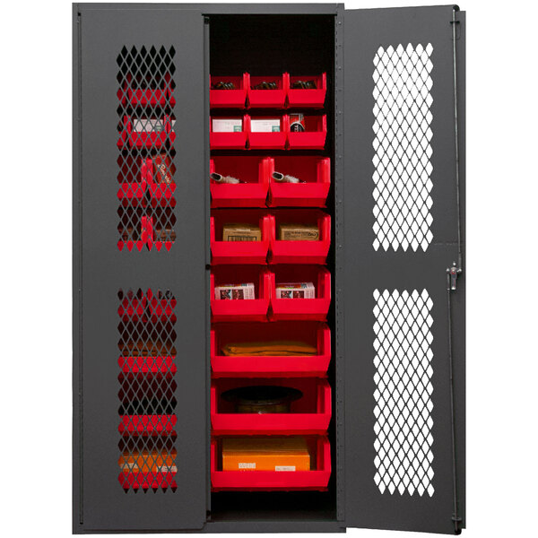 A Durham metal storage cabinet with red bins on shelves.