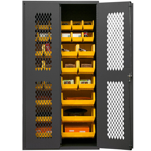 A metal Durham storage cabinet with yellow bins inside.