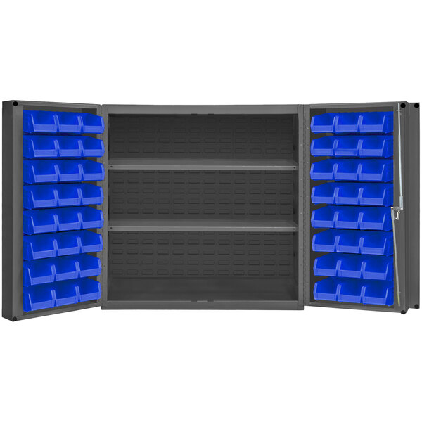 A gray metal Durham storage cabinet with blue bins on shelves.