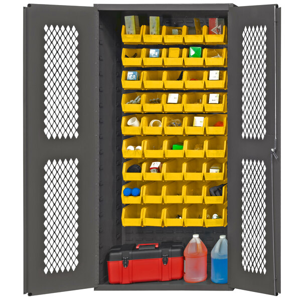 A metal Durham storage cabinet with yellow plastic bins.