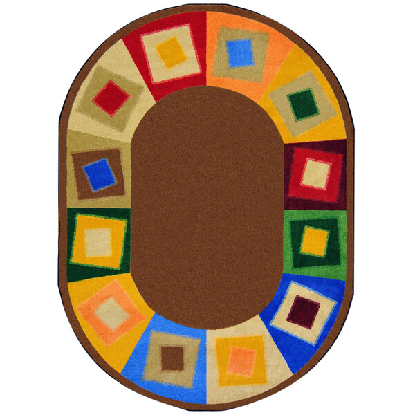 An oval neutrals rug with colorful squares in the middle.
