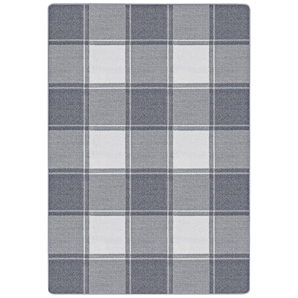 A Joy Carpets Impressions Highlander area rug with a gray and white plaid checkered pattern and white border.