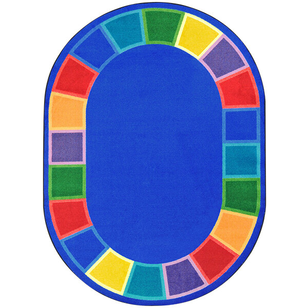 A multi-colored oval area rug with a rainbow border and a circle in the middle.