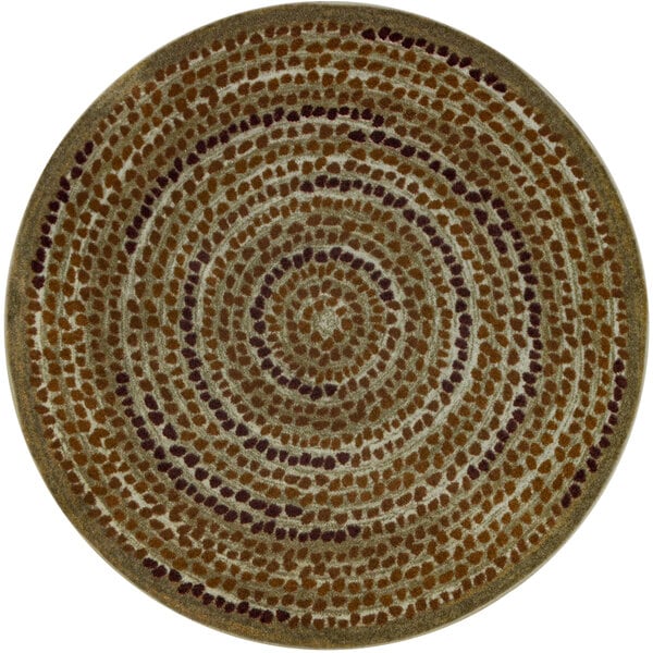 A Joy Carpets terracotta round area rug with a circular pattern resembling dots.