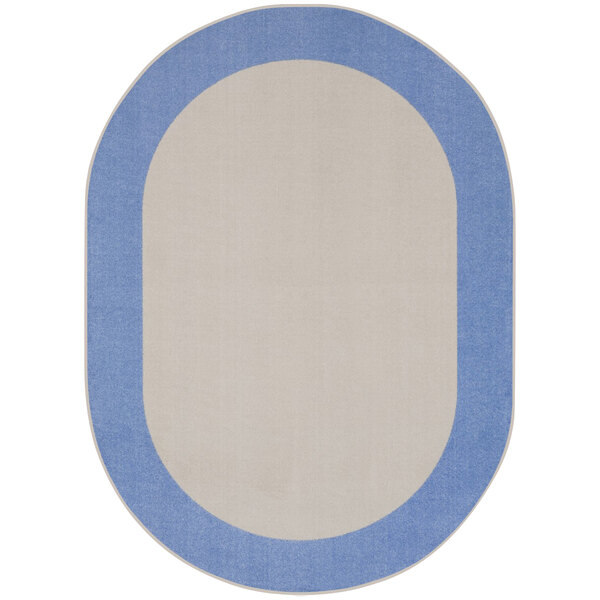 A light blue oval rug with a white border and blue accents.