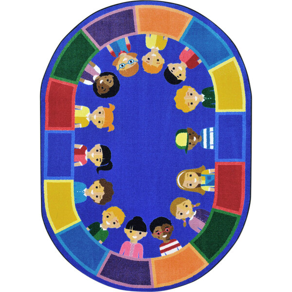 An oval multi-colored area rug with cartoon children in a circle.