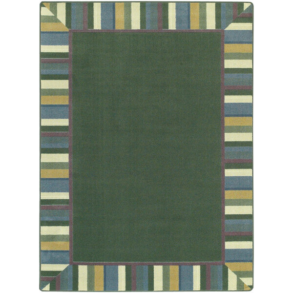 A green area rug with a border and colorful stripes.